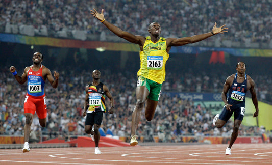 Usain Bolt crossing the finish line