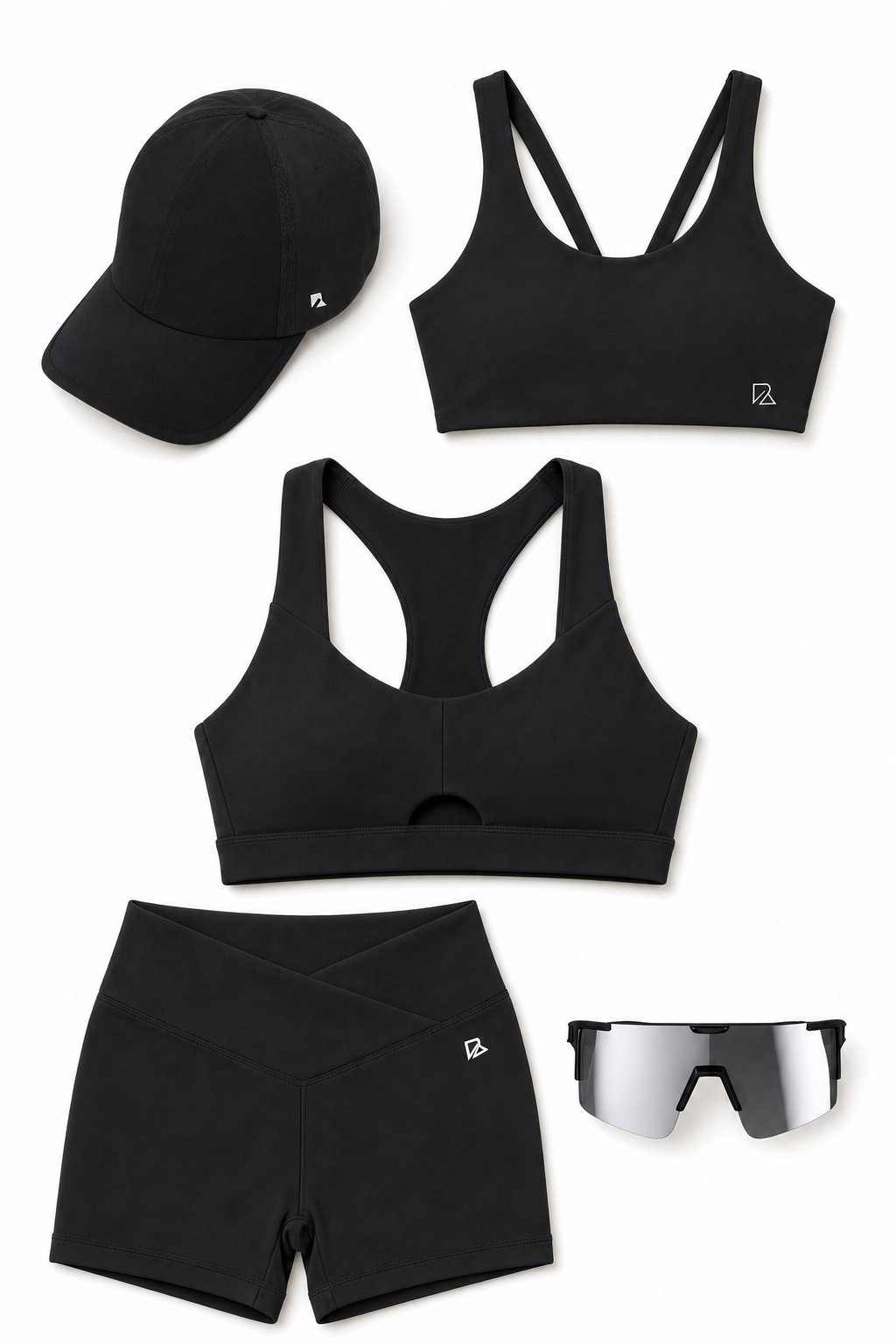 The Ultimate Black Run Bundle flat lay: running hat, two sports bras, mini sculpting shorts and X365 polarized sunglasses
