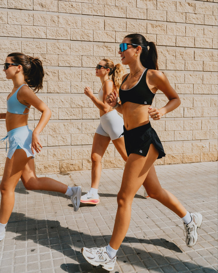 FlyAway fabric detail on the Cheeky Flyaway Women's Split Running Shorts - Black