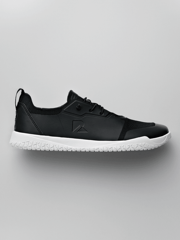 Black hybrid barefoot trainer with white sole, premium athletic design from Runner's Athletics.