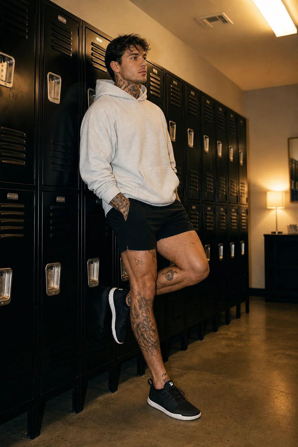 Black mens minimalist barefoot trainer on model in locker room lifestyle setting