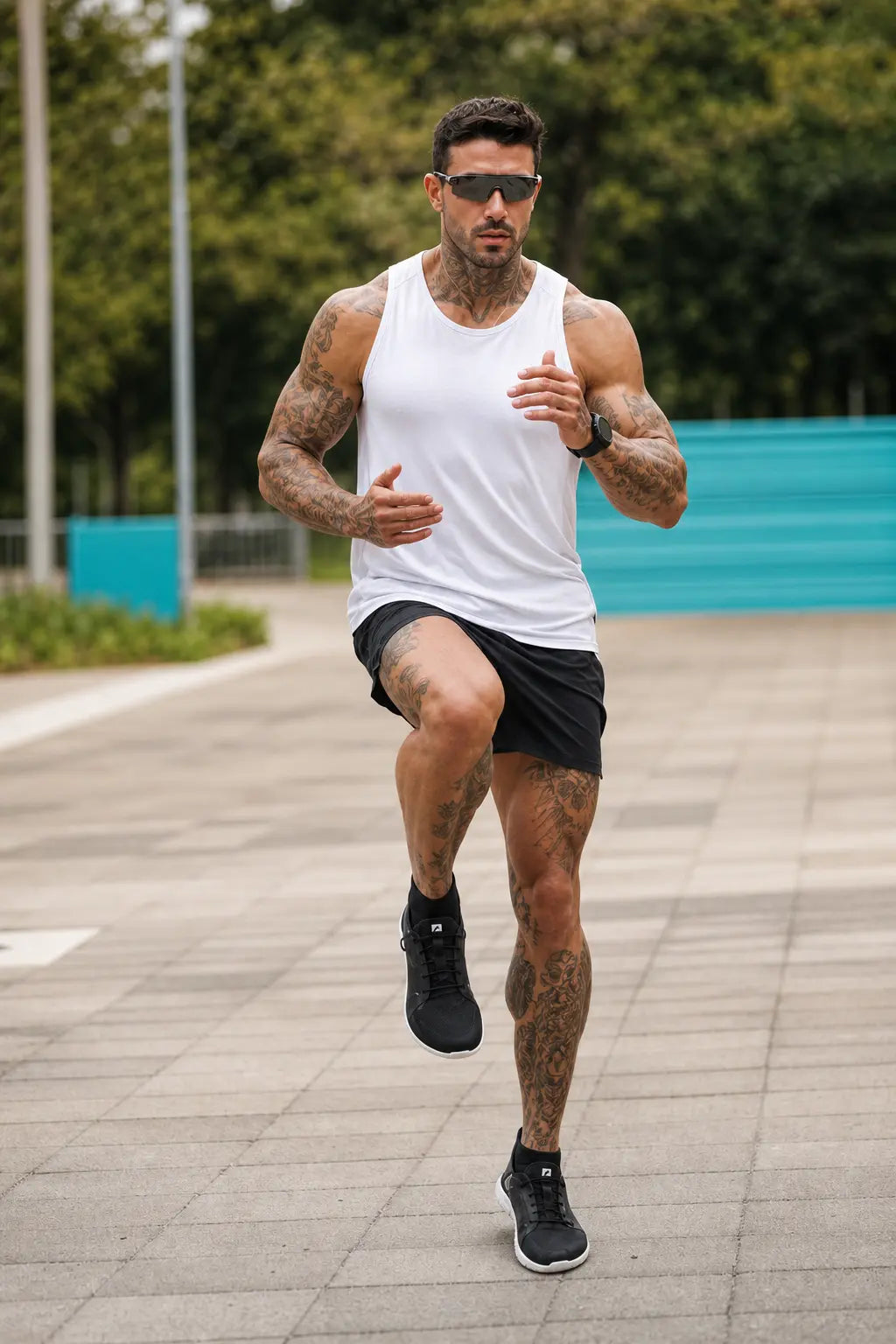 Black mens minimalist barefoot trainer on model running on outdoor track