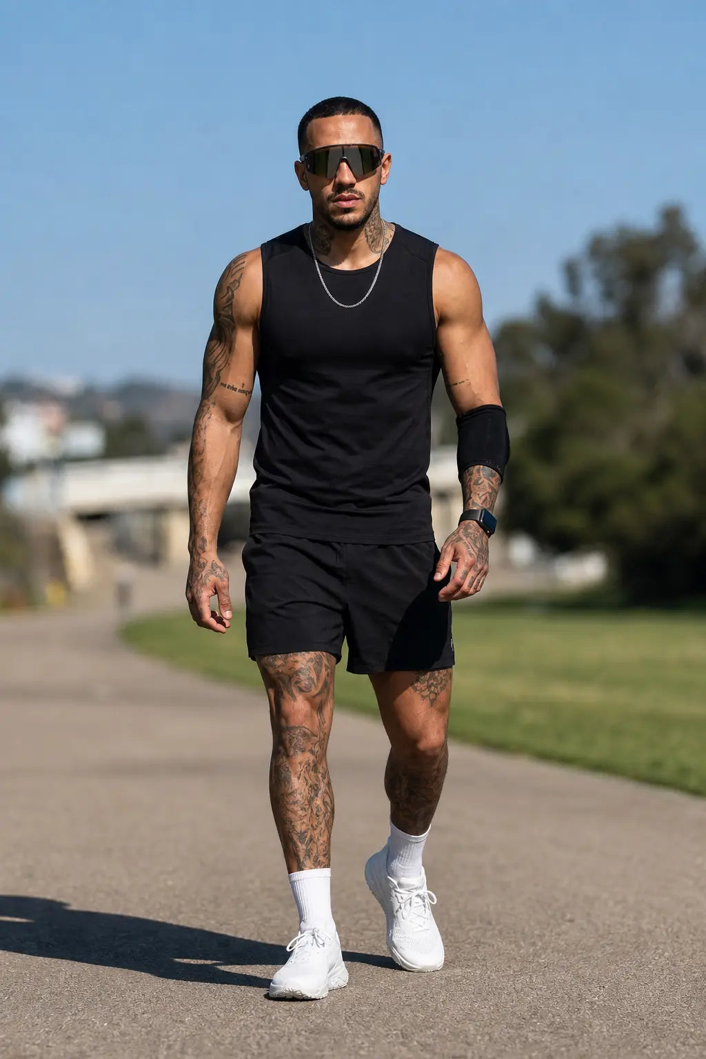 White mens minimalist barefoot trainer on model walking outdoor running path