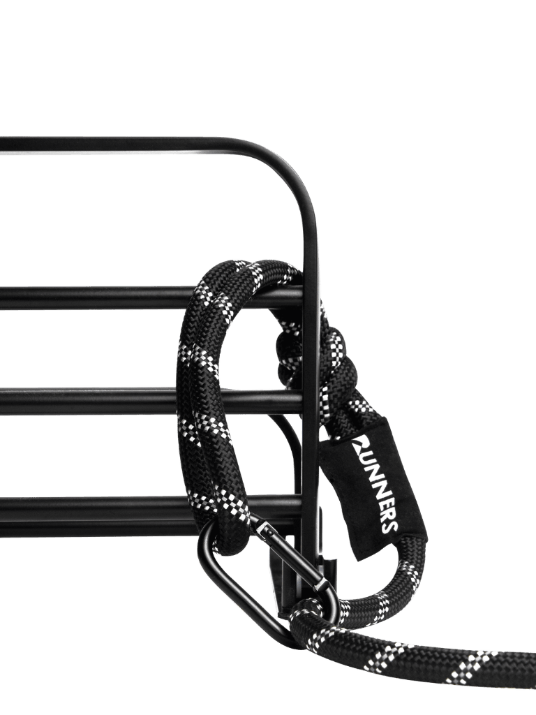 Black and white braided hands-free dog leash with carabiner attachment from Runners Athletics
