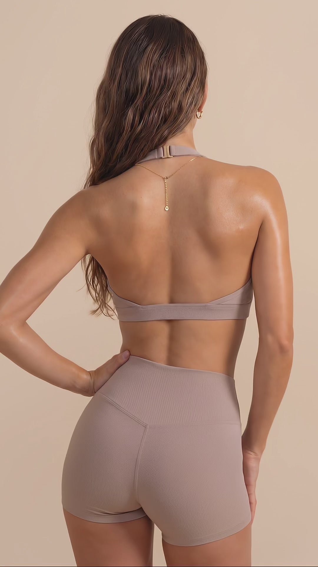 Woman in brown halter push up sports bra video