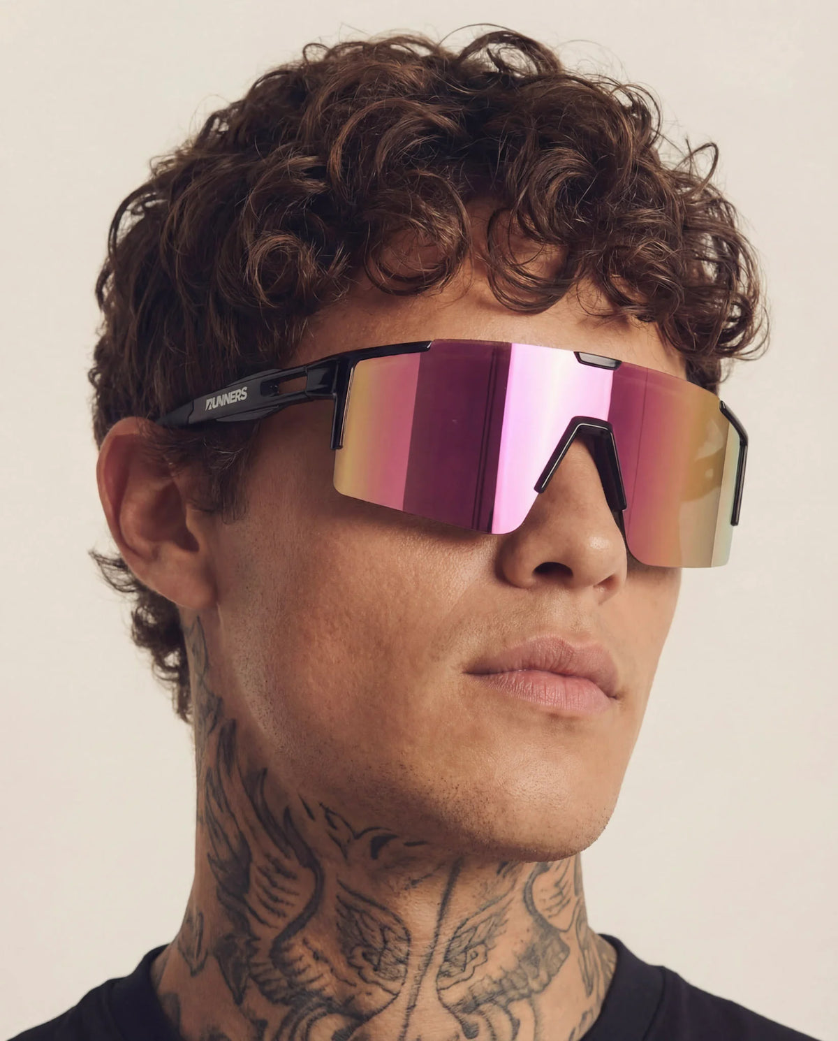 Cherry pink X365 running sunglasses angled view frameless design