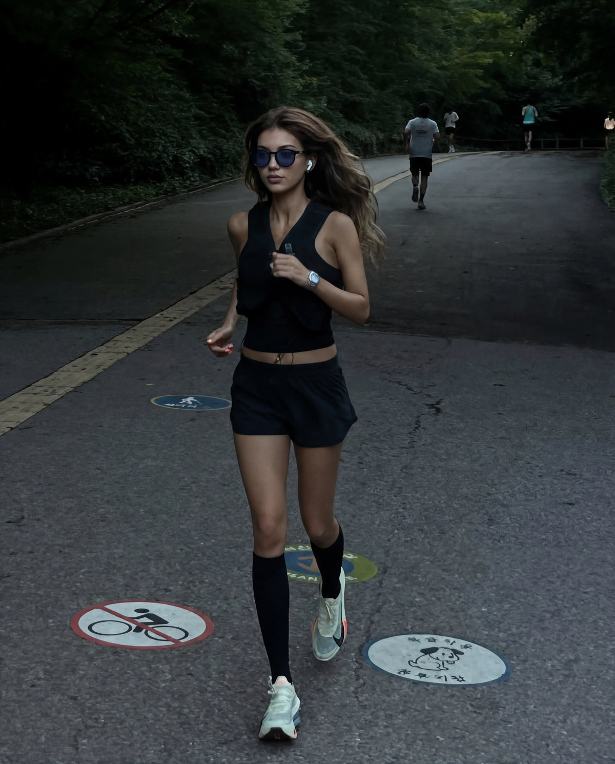 Olympians midnight blue round running sunglasses on woman from Runners Athletics running in park 