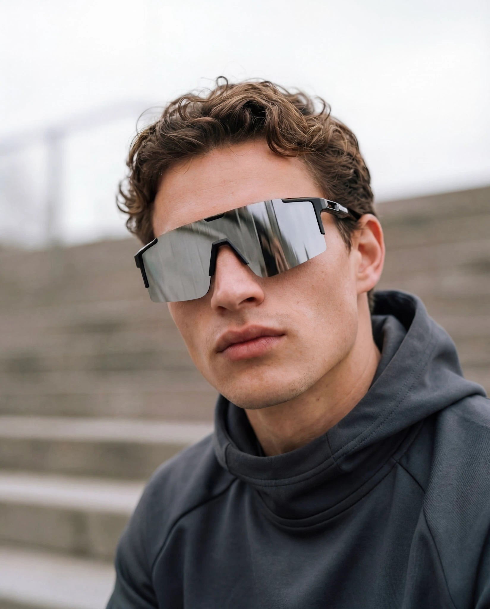 Man wearing revo silver polarized running sunglasses 