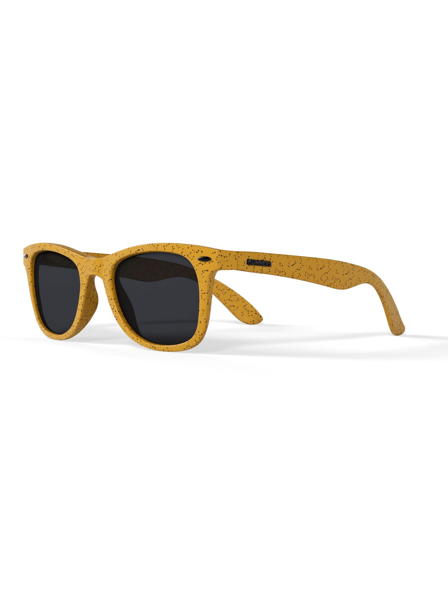 Sunglasses with yellow frame and black lenses on a green background