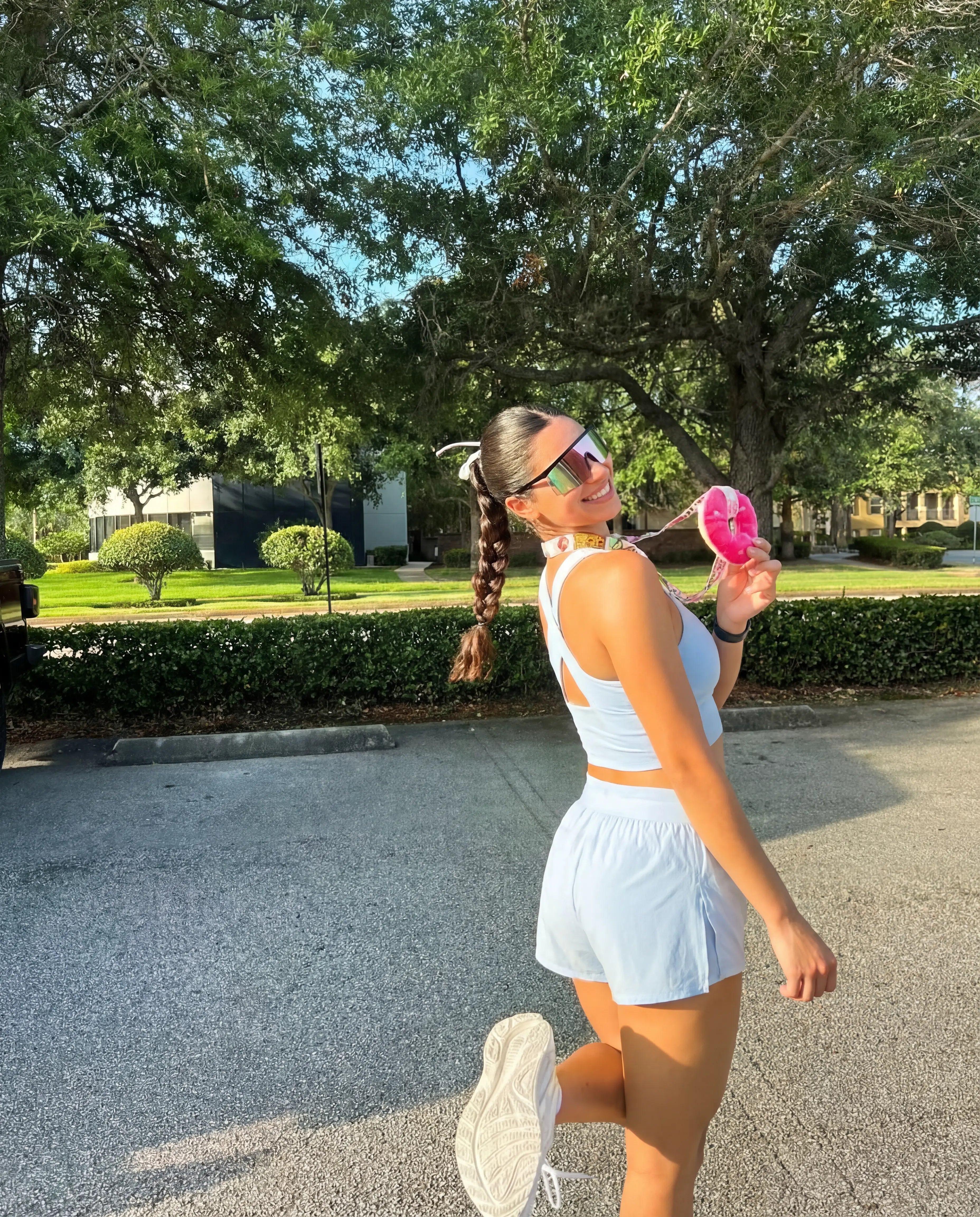 Baby blue workout set functional tank and flyaway shorts worn outdoors running