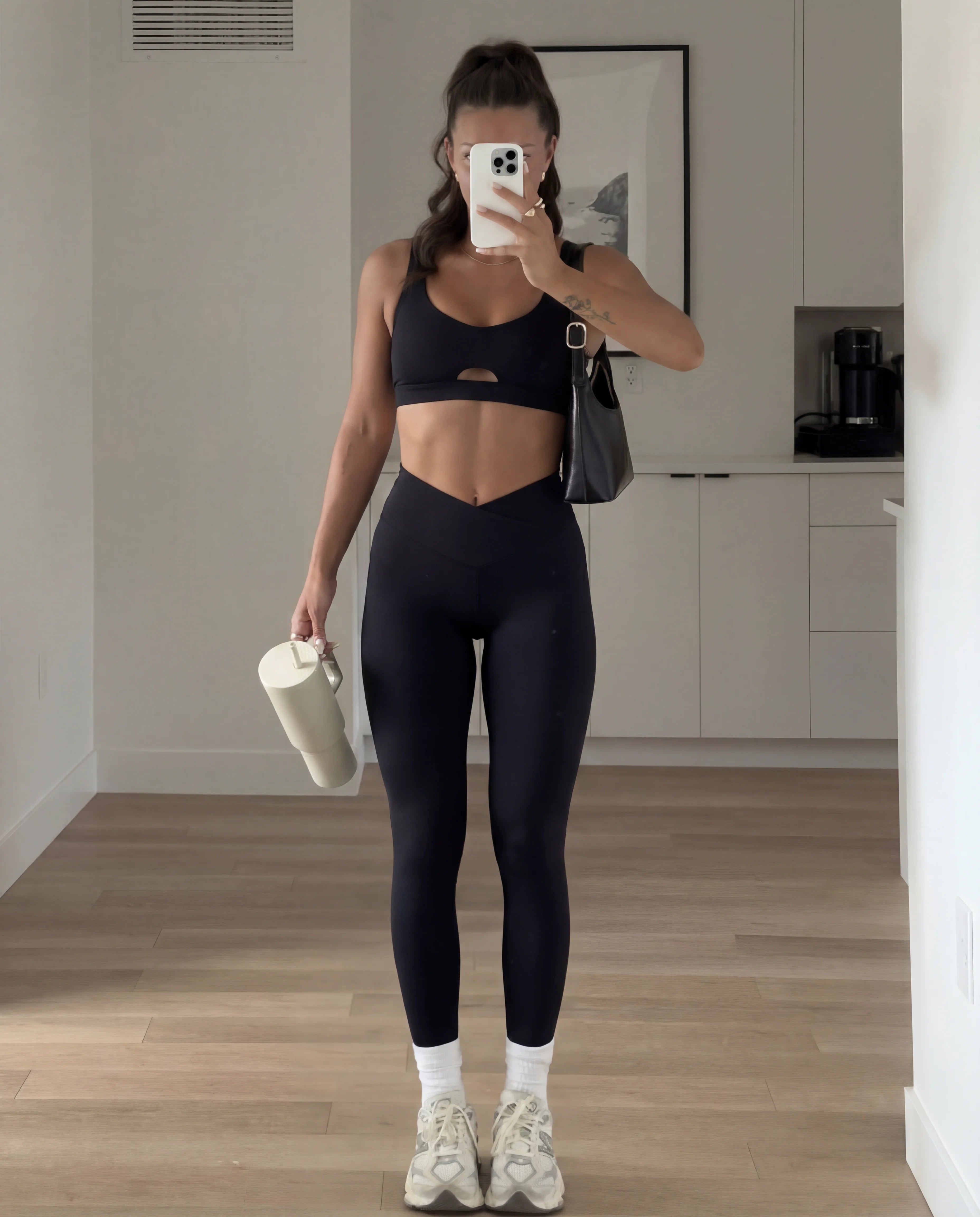 Black workout set heart bra and leggings home mirror selfie full length with gym bag