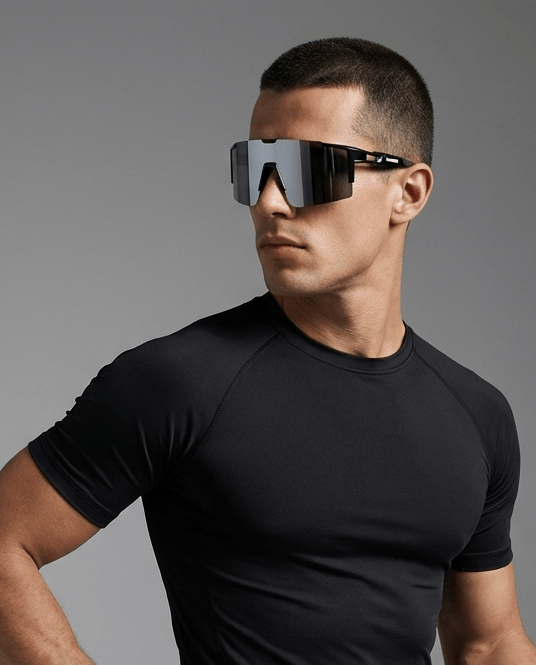 Man wearing Premium Revo Silver X365 running sunglasses with black athletic shirt